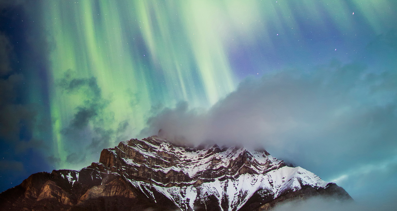 Northern_Lights_Cascade_Banff_Paul_Zizka_Vertical_1500