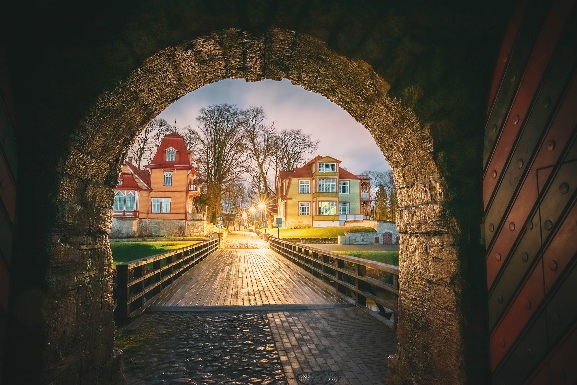 Kuressaare, Saaremaa Island, Estonia. Passage Entrance From Episcopal Castle. Traditional Medieval Architecture, Famous Attraction Landmark. Episcopal Castle In Night. Traditional Medieval