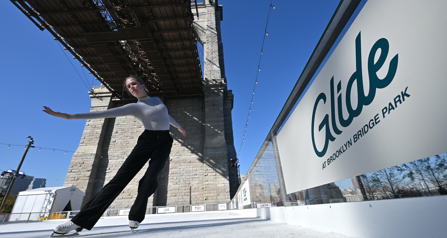 BROOKLYN, NEW YORK - NOVEMBER 16:  Kaitlyn Weaver ice skates at the Season Opening of Glide at Emily Warren Roebling Plaza, Brooklyn Bridge Park on November 16, 2023 in Brooklyn, New York. (Photo by Bryan Bedder/Getty Images for Glide)